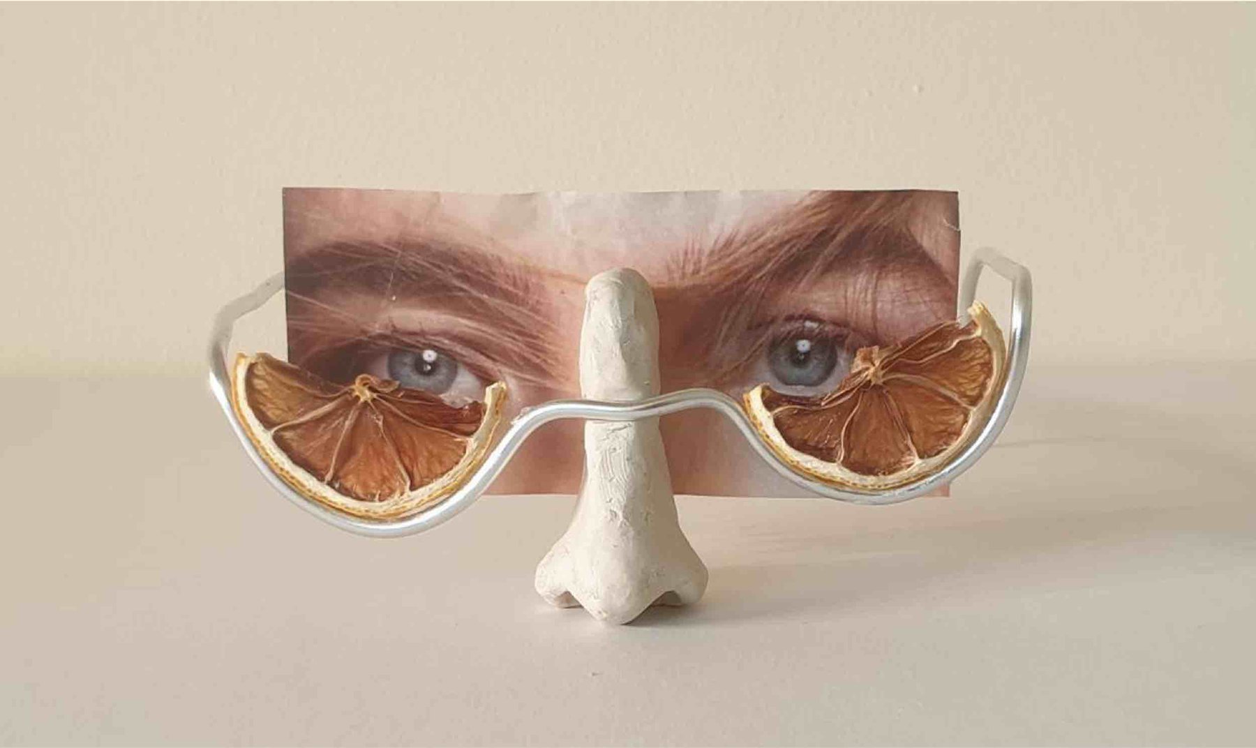Glasses worn by an image of eyes