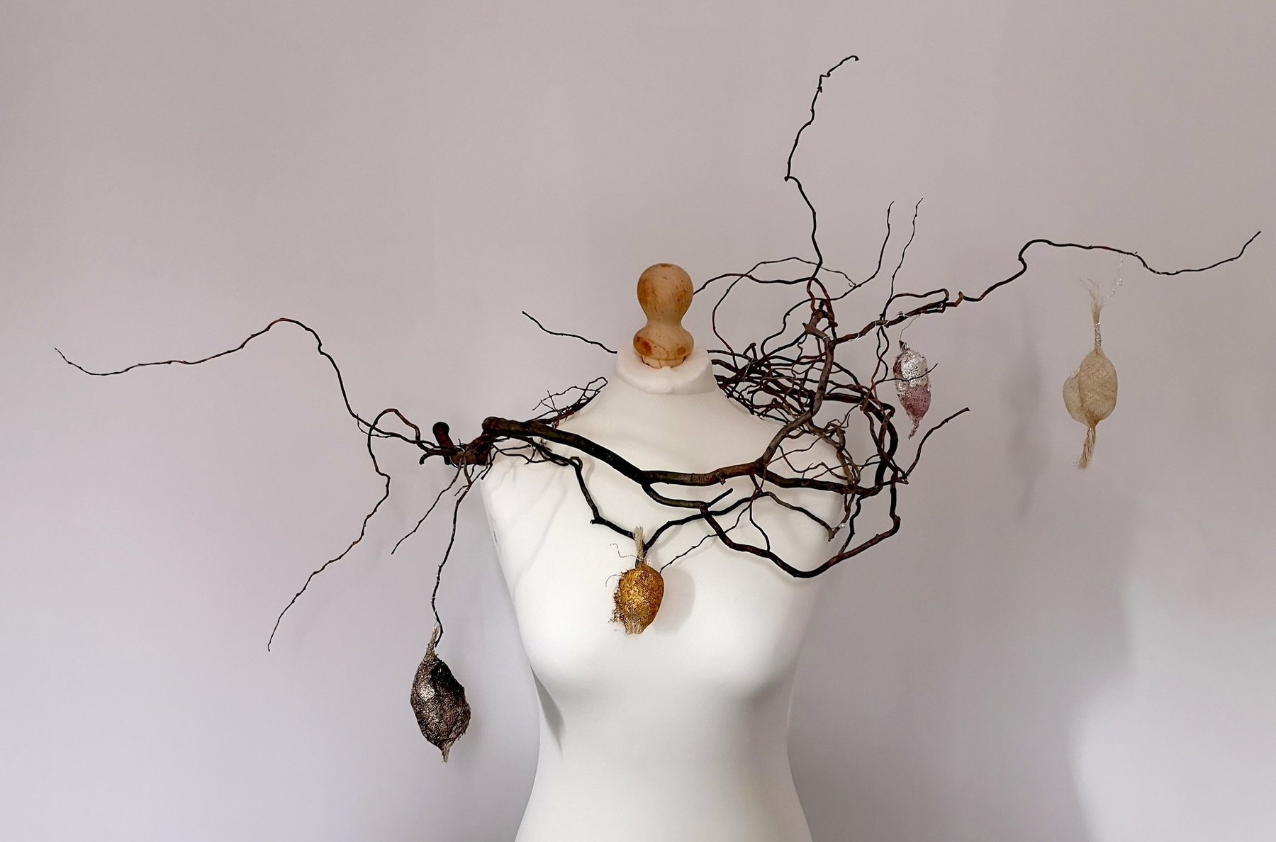 Mannequin with twigs