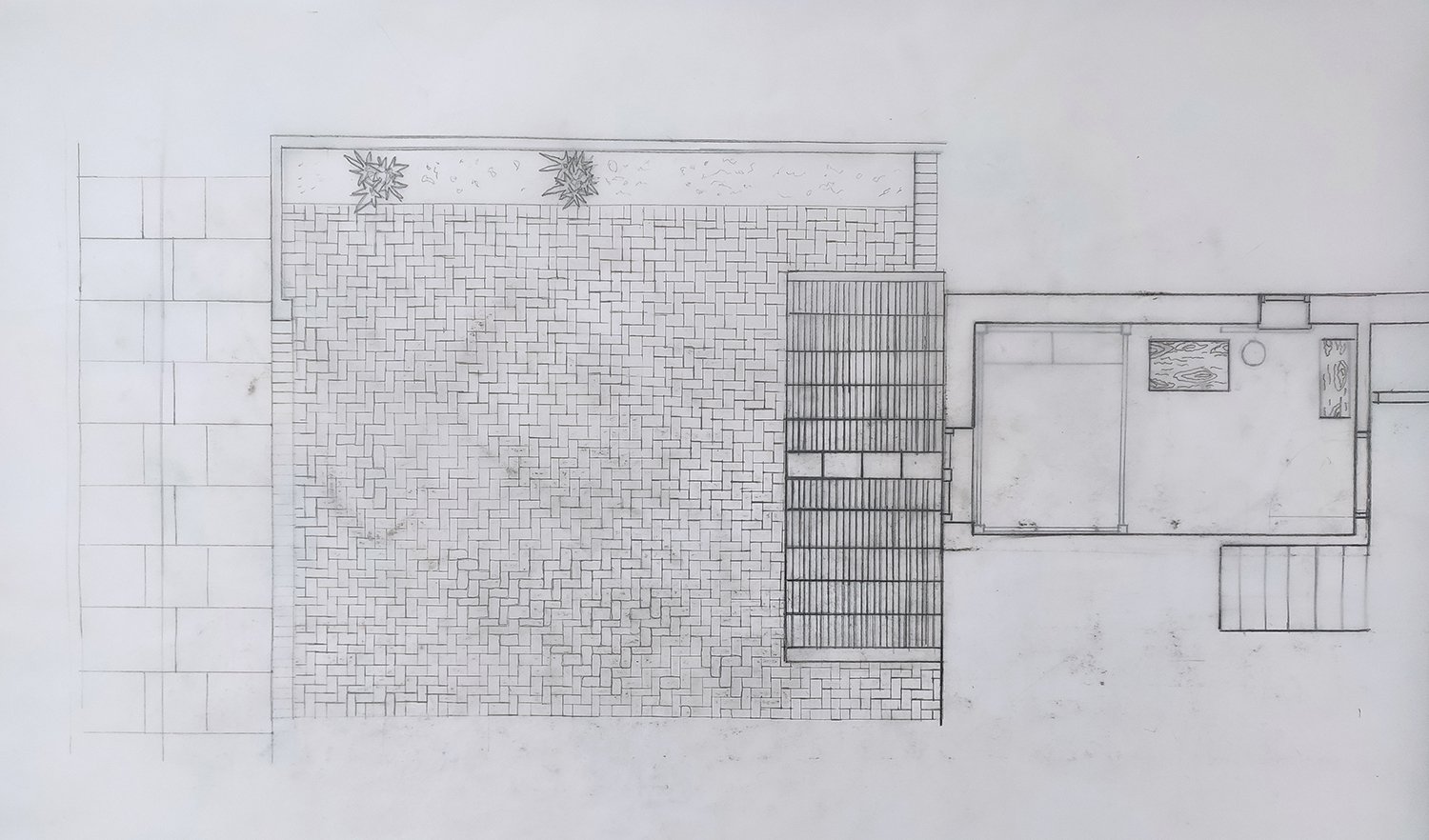 A plan drawing of the pavement in front of a house, showing also the inside plan of a room