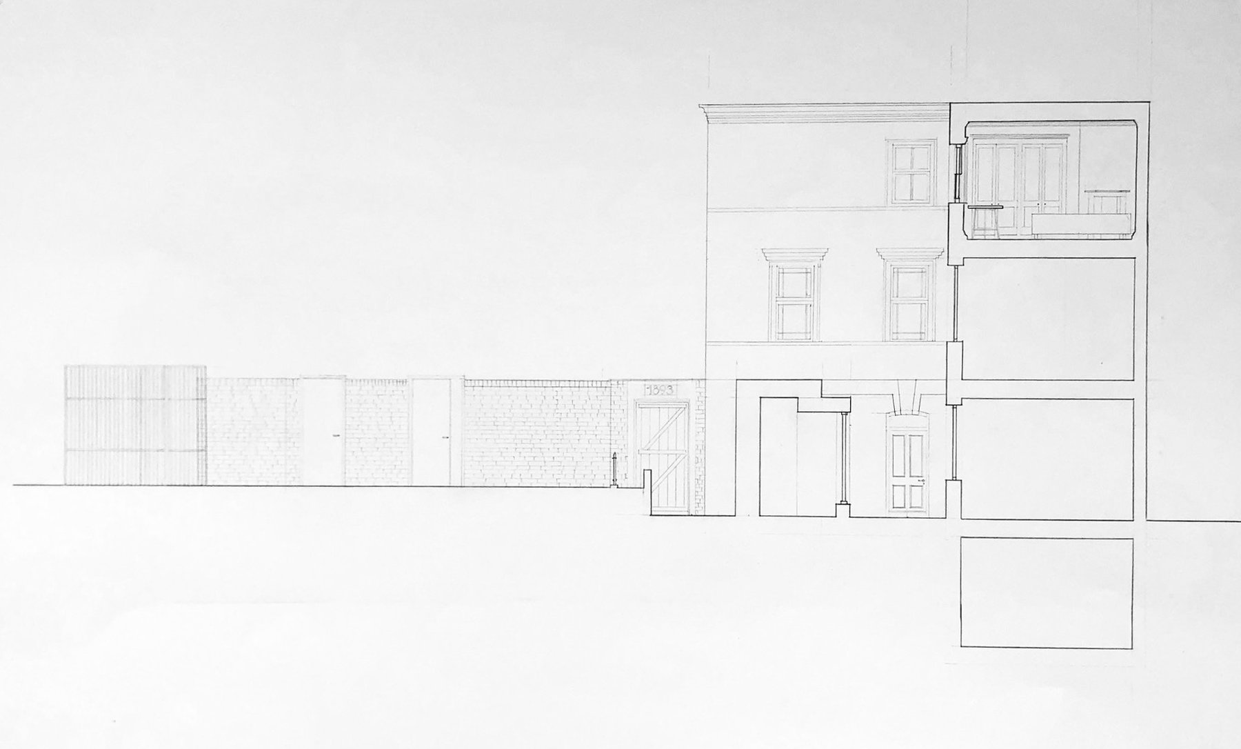 This is a section pencil drawing  through a building and the surrounding site. Particular care has been put into the thicknesses of the lines and precision in showing brickwork and architectural elements